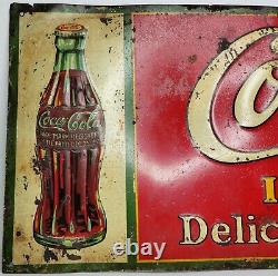 1931 Coca-Cola, 28 X 10, embossed, In Bottles, Delicious & Refreshing, sign