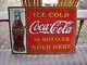 1931 Embossed Tin Coca Cola Christmas Bottle Sign