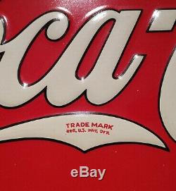1933 Coca-Cola Ice Cold Sold Here round, embossed, painted metal sign
