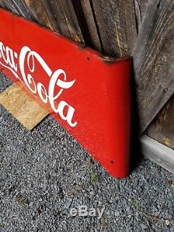 1950s Coca Cola Sled Sign. 68inx24in. Porcelain