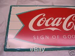 1960's vintage Coca-Cola Fishtail and Bottle. Old original tin sign