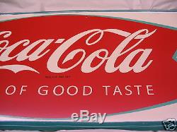 1960's vintage Coca-Cola Fishtail and Bottle. Old original tin sign