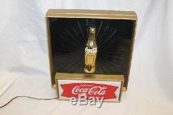 1960s Coca-Cola fishtail light-up Starburst sign with gold bottle