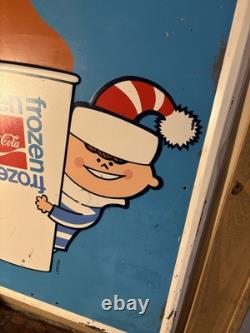 1969 Embossed Frozen Coca Cola Slushy Sign Hills Department Store Christmas Elf