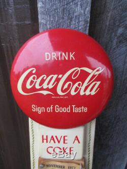 Coca-Cola Button Disc Calendar Sign 1958 Sign of Good Taste