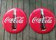 Coca-Cola Set of 2 Distressed 24 Inch Red Disc Button Signs Contour Bottle