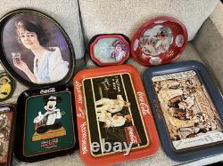Coca-Cola Vintage Collectible Tray Set with Various Designs