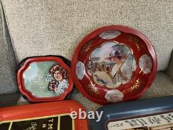Coca-Cola Vintage Collectible Tray Set with Various Designs