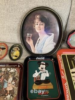 Coca-Cola Vintage Collectible Tray Set with Various Designs