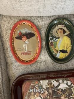 Coca-Cola Vintage Collectible Tray Set with Various Designs
