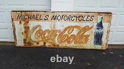 Coca-Cola sign With Motorcycle shop Sign
