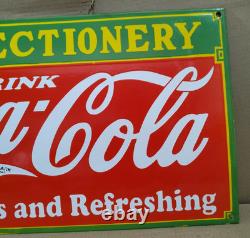 Drink Coca Cola confectionery Porcelain Enamel Sign 24 x 14 Inches 1 Sided