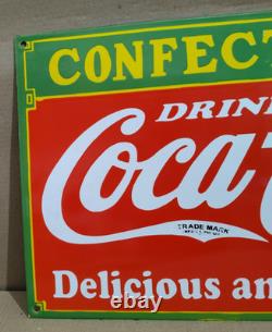Drink Coca Cola confectionery Porcelain Enamel Sign 24 x 14 Inches 1 Sided