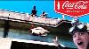 Pulling Vintage Coca Cola Sign From River