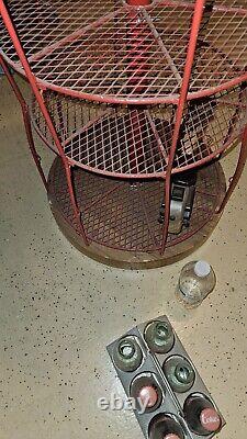 Rare, Tall, used vintage red steel & mesh Coca- Cola display stand collectible