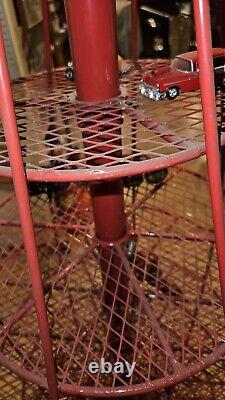 Rare, Tall, used vintage red steel & mesh Coca- Cola display stand collectible