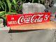 VINTAGE (COCA COLA) EMBOSSED METAL TACKER SIGN (16.75x 4) NEAR MINT/NOS