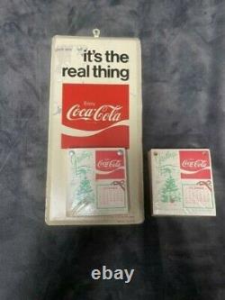 VTG 1974-75 Coca Cola It's the Real Thing Coke Advertising Tin Sign Calendar