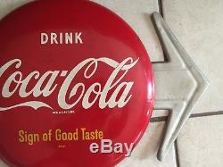 Vintage Coca Cola button sign with arrow