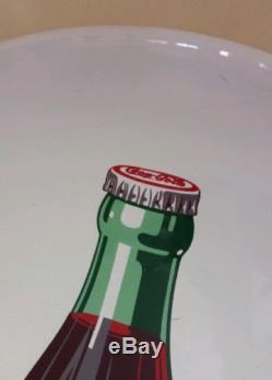 Vintage Coca Cola white porcelain 24 button with Coke Bottle on front