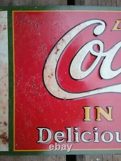 Vintage coca cola tin sign